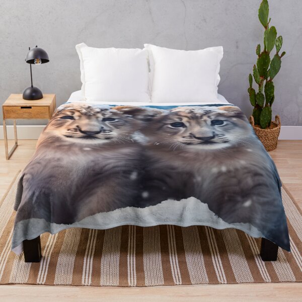 Item preview, Cute African baby lion cub, little wild cat predator animal in the snow photography designed and sold by NBSStore.