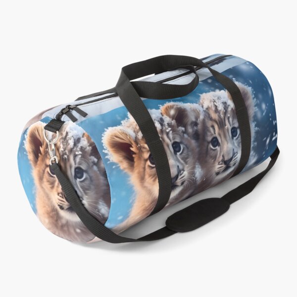 Item preview, Cute African baby lion cub, little wild cat predator animal in the snow photography designed and sold by NBSStore.