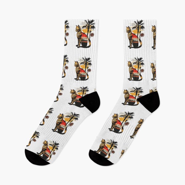 Item preview, Cat sitting in front of a tropical scene with palm trees designed and sold by BlueGoldArt.