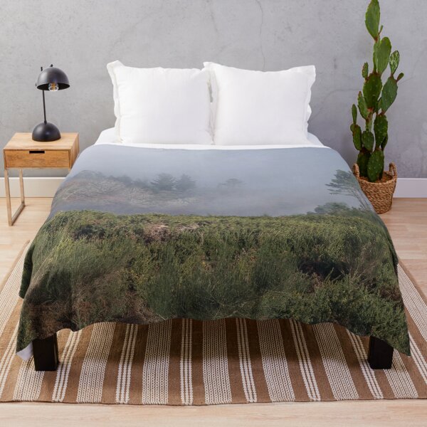 Item preview, A landscape of rolling green terrain surrounded with fog designed and sold by NancyKHajjar.