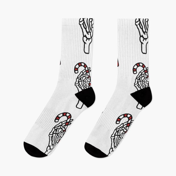 Item preview, Skeleton hand with Christmas candy stick  designed and sold by Tropical Blood.