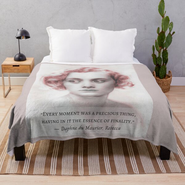 Item preview, Daphne du Maurier portrait with a  quote from Rebecca: Every moment was a precious thing, having in it the essence of finality. designed and sold by artbleed.
