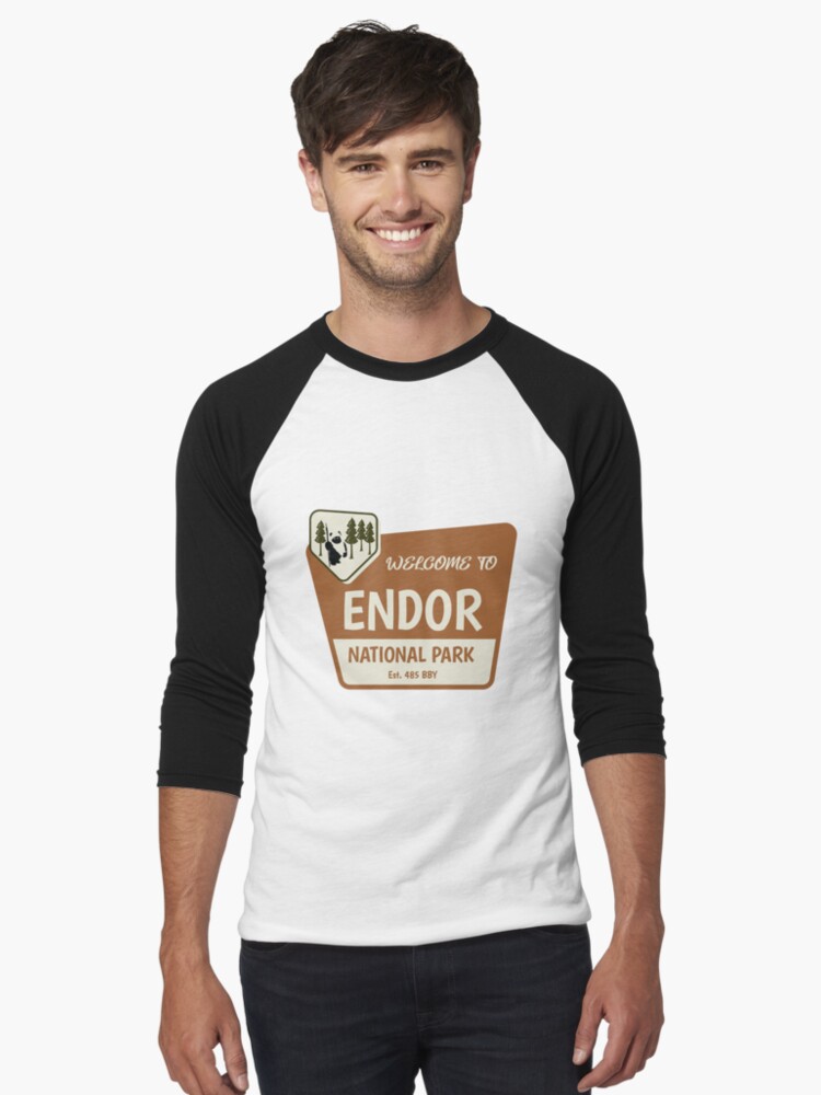 Imagen 1 de 3, Camiseta ¾ estilo béisbol con la obra Bienvenido a Endor, diseñada y vendida por FitCheckApparel.