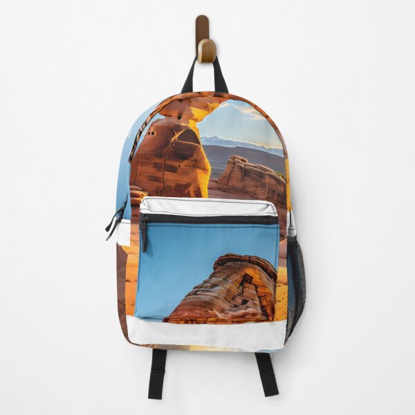 Item preview, A rock arch in the desert with arches national park in the background designed and sold by johndesign88.