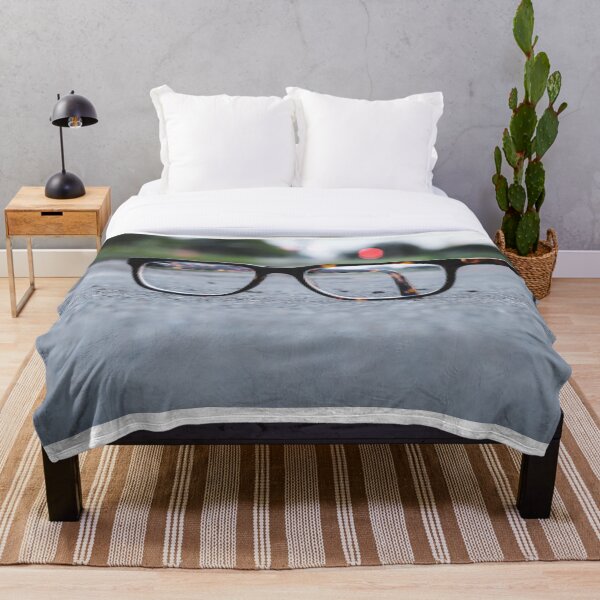 Item preview, Through a pair of glasses, dimly designed and sold by Joel Bader.