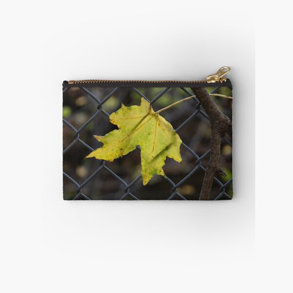 Item preview, Leaf Caught in a Fence designed and sold by Calidris Fotografie Steffi & Ben Köppler.