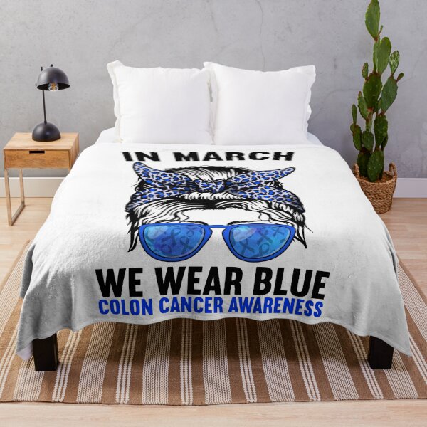 Item preview, In March We Wear Blue For Colon Cancer Awareness Messy Bun designed and sold by MobyStickers.