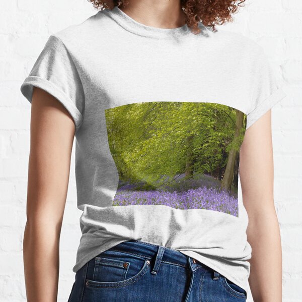 Bluebells nestle under a beech tree in the English Springtime Classic T-Shirt