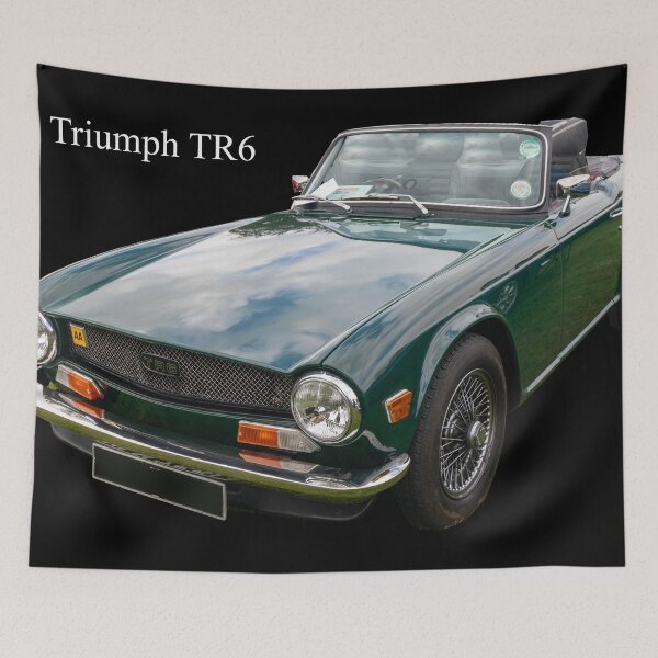Artikelvorschau, 1971 Triumph TR6 in British Racing Green entworfen und verkauft von Kevin Hellon.