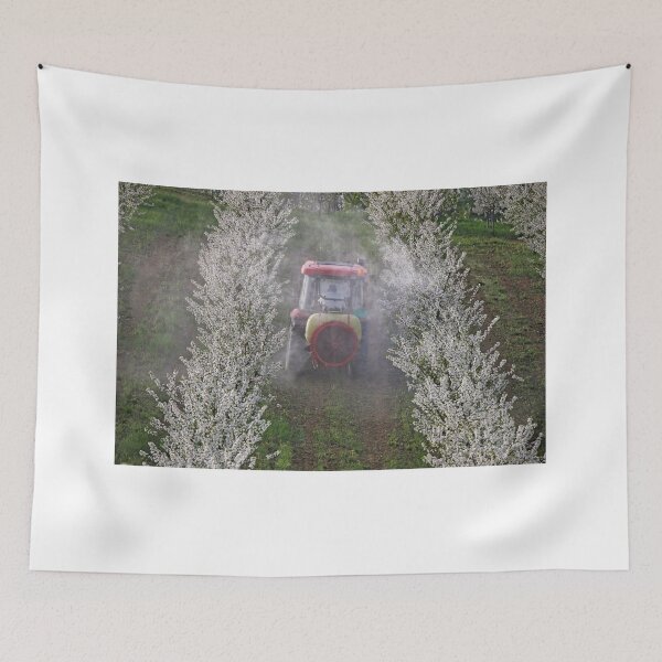 Item preview, tractor sprays insecticide in orchard agriculture industry springtime designed and sold by goceris.