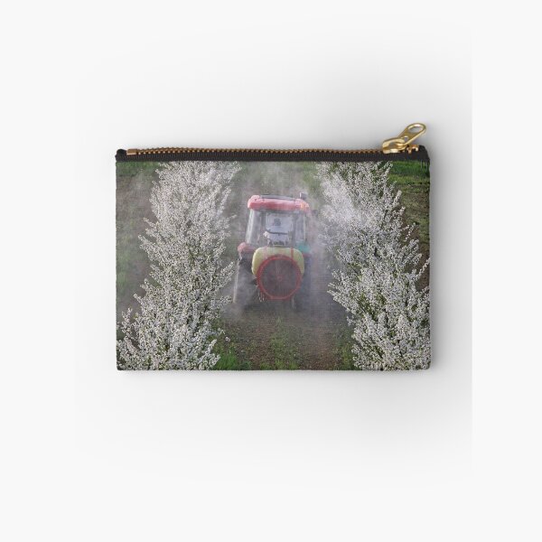 Item preview, tractor sprays insecticide in orchard agriculture industry springtime designed and sold by goceris.