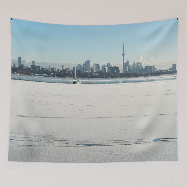 Item preview, Lake Ontario Ice and Snow Expanse with Toronto Skyline and a Sailboat designed and sold by Georgia Mizuleva.