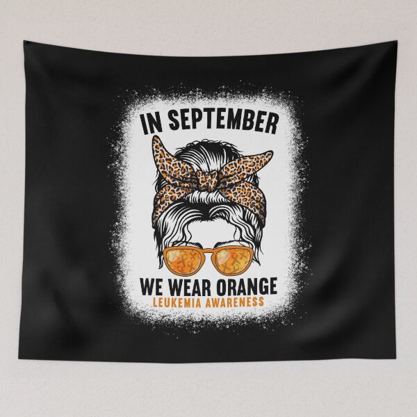 Item preview, In September We Wear Orange Leukemia Awareness Messy Bun designed and sold by MobyStickers.