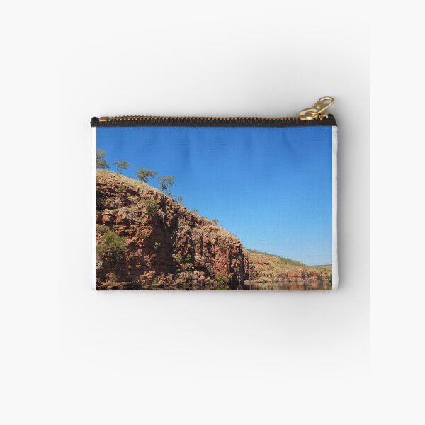 Item preview, Reflection of a red cliff face with trees in a blue river designed and sold by EAnneH.