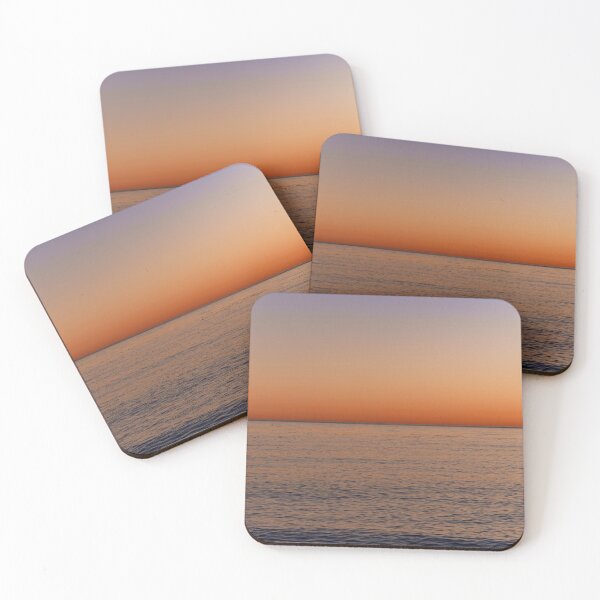 Item preview, Gold-orange glowing sunset at the sea - photo designed and sold by CineWanderlust.