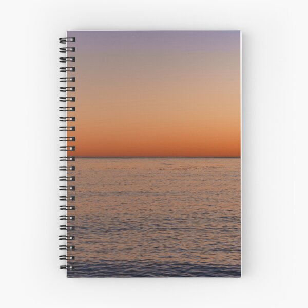 Item preview, Gold-orange glowing sunset at the sea - photo designed and sold by CineWanderlust.