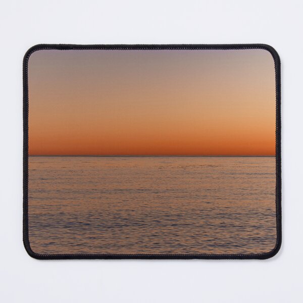Item preview, Gold-orange glowing sunset at the sea - photo designed and sold by CineWanderlust.