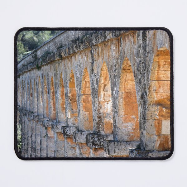 Item preview, Sandstone arches of an aqueduct stretching into a forest. designed and sold by EAnneH.