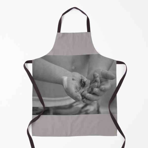 Item preview, A young child's hands holding a water bug designed and sold by FoxGlove5.