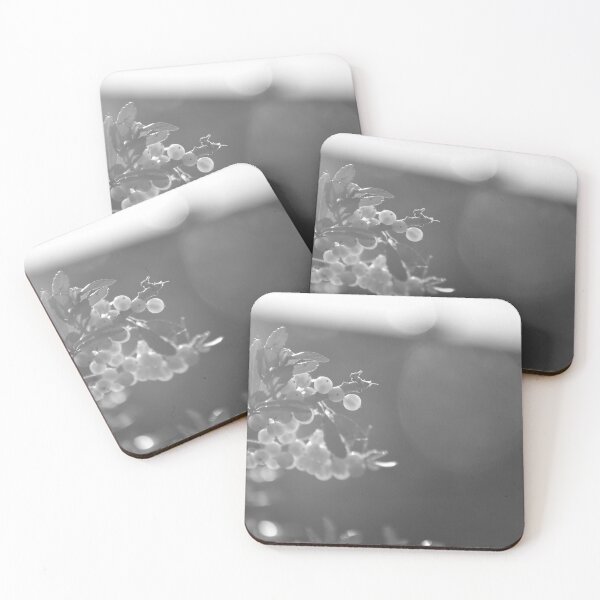 Item preview, Black and white holly berries bokeh in winter designed and sold by FoxGlove5.