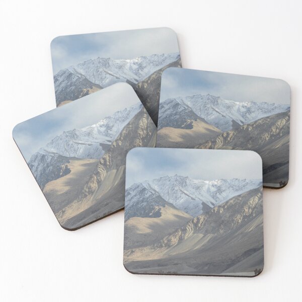 Item preview, Camels with their riders are dwarfed by snow-covered mountains. designed and sold by EAnneH.