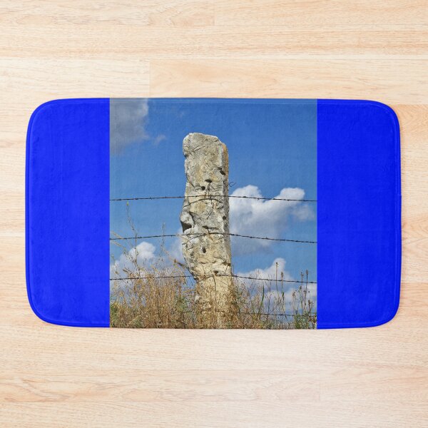 Item preview, Stonepost fence with grass and blue sky in Kansas. designed and sold by ROBERTDBROZEK.