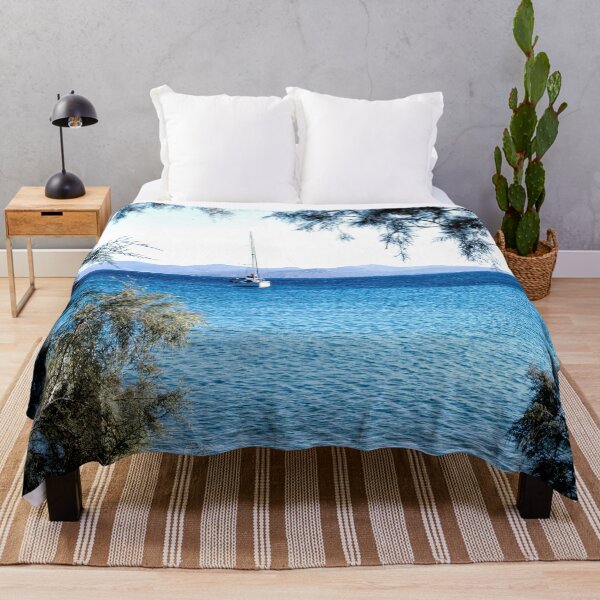 Item preview, Sailing on Ocean, Sailboat Photo, Trees on Beach designed and sold by IdoFriedmanArt.