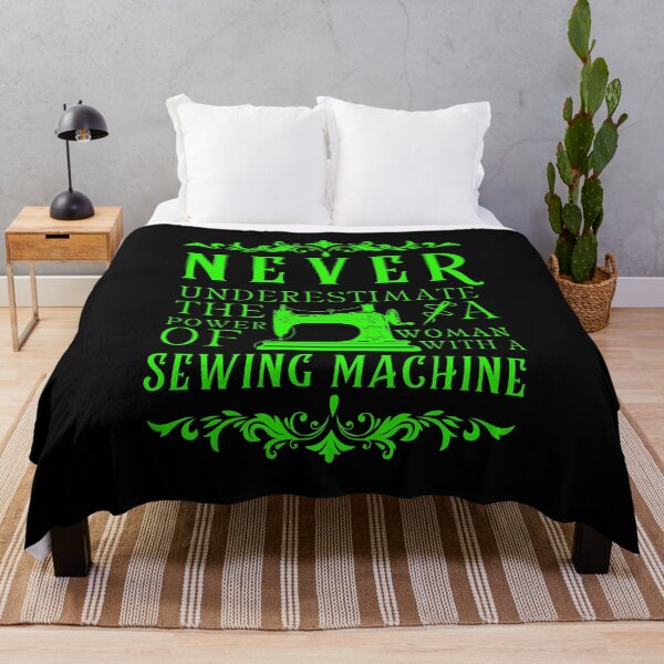 Item preview, Never Underestimate The Power Of A Woman With A Sewing Machine designed and sold by Wiss2Arts.