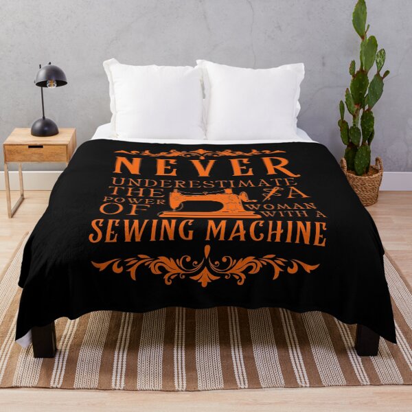 Item preview, Never Underestimate The Power Of A Woman With A Sewing Machine designed and sold by Wiss2Arts.