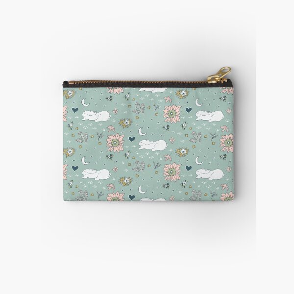 Item preview, Sleeping white rabbits on green meadow at night designed and sold by colorofmagic.