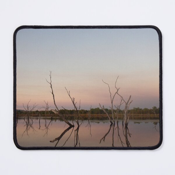Item preview, Dead tree stumps reflected a river at sunset. designed and sold by EAnneH.