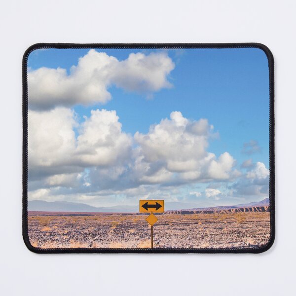Item preview, Direction sign in the desert under a blue sky. Concept of uncertain, risk, choice, decision designed and sold by Paolo Modena Photography    -   Fine Italian Art.