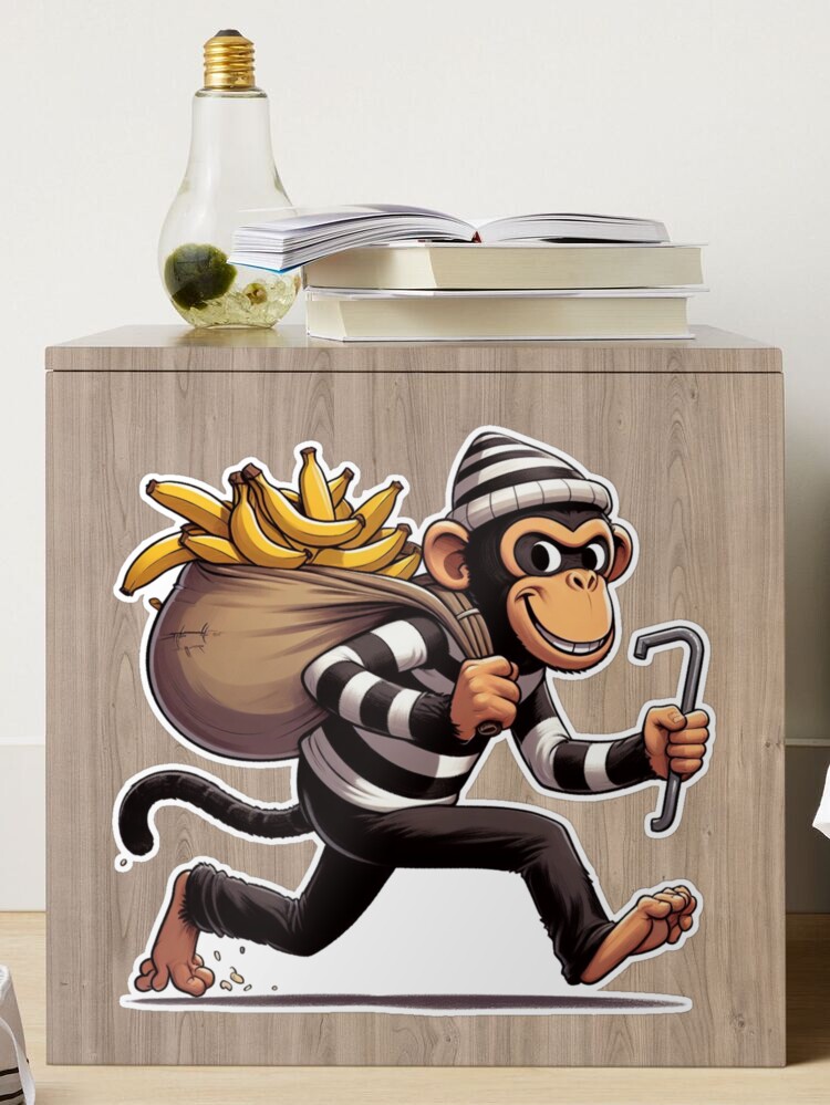 A very naughty monkey thief stealing bananas