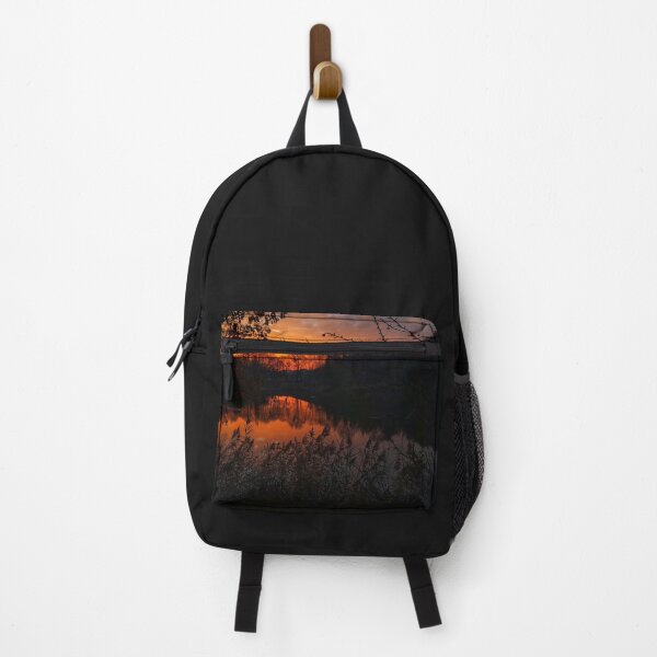 Item preview, Serene sunset setting over tranquil lake designed and sold by bartekg3.