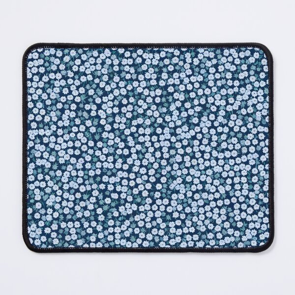 Aperçu de l'œuvre Motif de petites fleurs bleues et blanches créée et vendue par Pixevol.