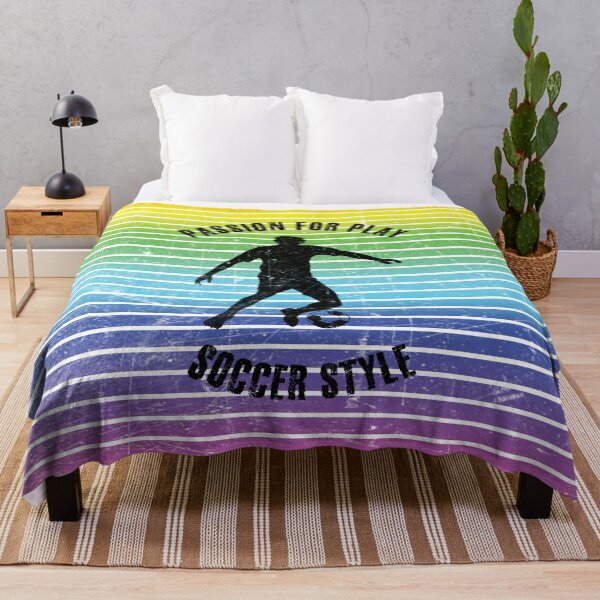Item preview, Black silhouette of a man training soccer against the background of rainbow stripes designed and sold by HarridanCreates.