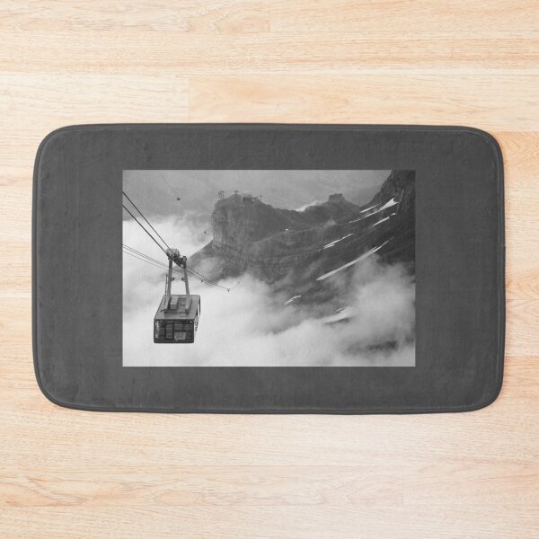 Item preview, Alpine Adventure: B&W Cable Car Descent through Cloud-Covered Peaks designed and sold by InbalTurShalom.