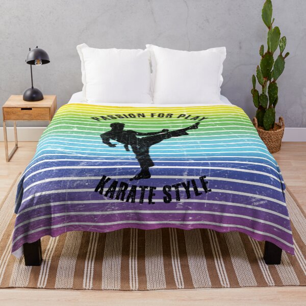 Item preview, Black silhouette of a man practicing karate against the background of rainbow stripes designed and sold by HarridanCreates.