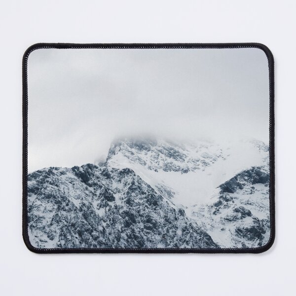 Item preview, Stunning snowy mountains covered by clouds designed and sold by Patrik Lovrin.
