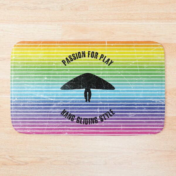 Item preview, Black silhouette of an athlete flying a hang glider against the background of rainbow stripes designed and sold by HarridanCreates.