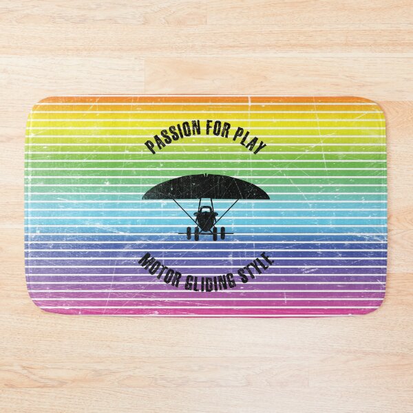 Item preview, Black silhouette of a motor glider against the background of rainbow stripes designed and sold by HarridanCreates.