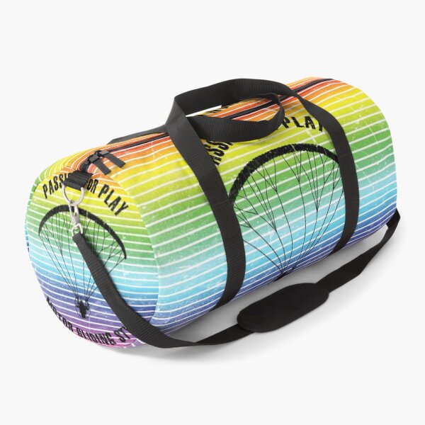 Item preview, Black silhouette of a man flying a paraglider against the background of rainbow stripes designed and sold by HarridanCreates.
