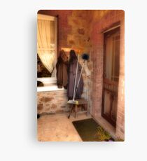 Coats and Brooms Canvas Print