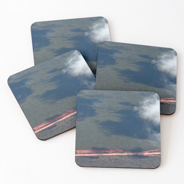 Item preview, Aerial view of highway bordered by red dirt and surrounded by trees. designed and sold by EAnneH.