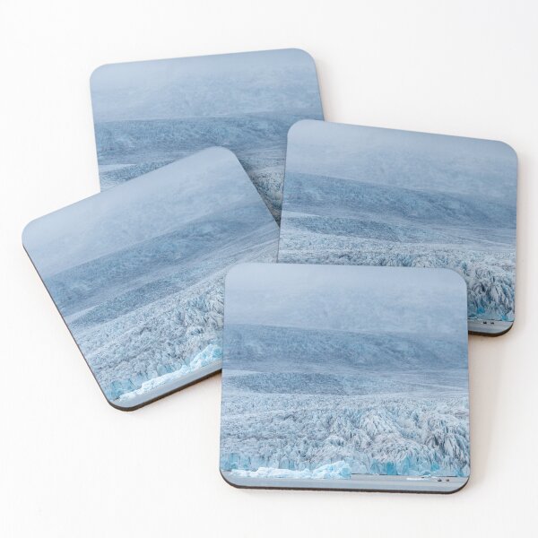 Item preview, Frozen landscape in a glacier lagoon with a glacier wall mountain in the background in Iceland designed and sold by jpferreiraphoto.