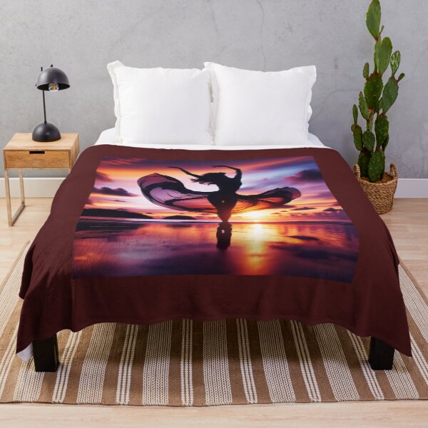 Item preview, Woman dancing, captured in mid-twirl, her form expressing freedom and beauty, against a backdrop of a sunset on a beach designed and sold by AndreaMart.
