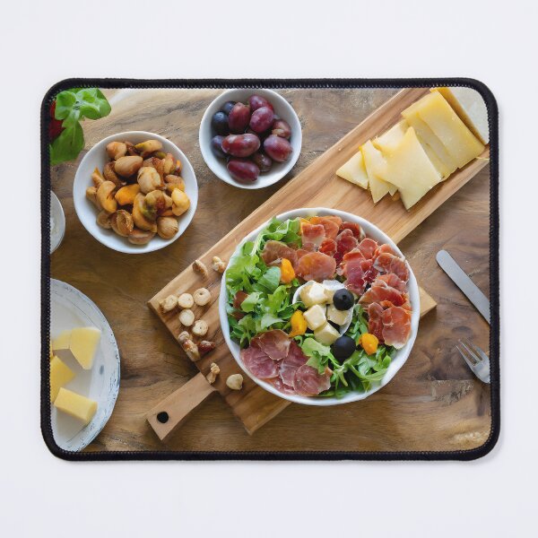 Item preview, Overhead view of a chopping board with cold meats, cheese, salad. designed and sold by coffeeflavour.