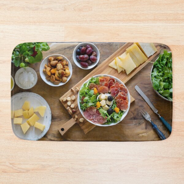 Item preview, Overhead view of a chopping board with cold meats, cheese, salad. designed and sold by coffeeflavour.