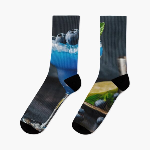 Item preview, A glass of blue cocktail with blueberry. Dark background. designed and sold by coffeeflavour.