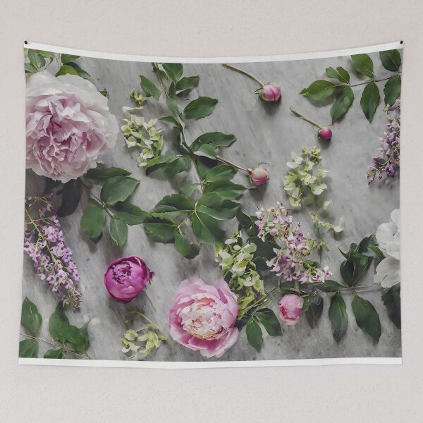 Item preview, Overhead view of a table with peonies, wisteria and green leaves. designed and sold by coffeeflavour.